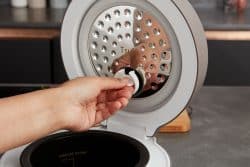 Tsuki rice cooker in grey removing steam cap