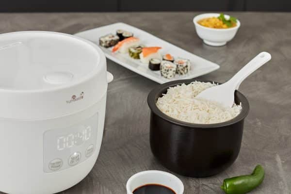 Tsuki rice cooker in white with rice in Shinsei bowl