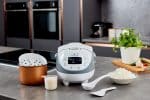 Yum Asia Panda mini rice cooker in kitchen with all accessories