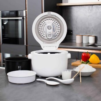 Yum Asia Fuji UMAI IH rice cooker on table with all accessories and lid open