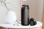 Iku black thermal vacuum flask on table