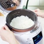 Yum Asia lifting cooked white rice using Ninja bowl and Sakura white rice cooker