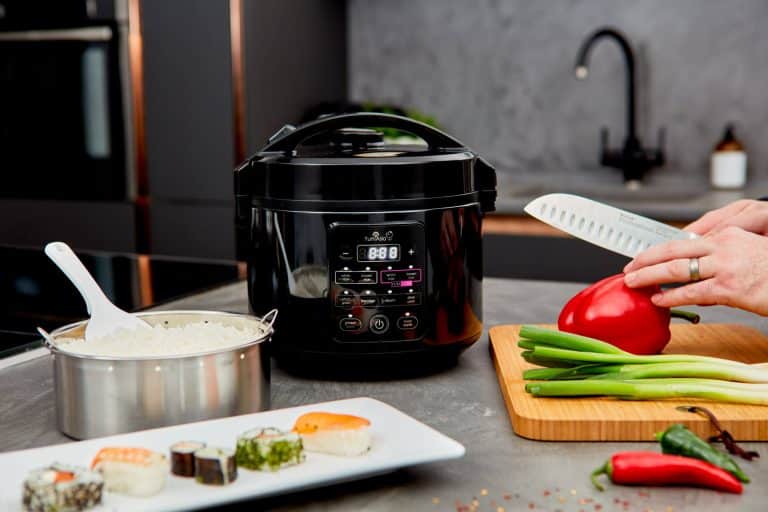 Kumo rice cooker front on table with food prepared