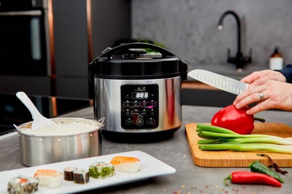 Kumo dark rice cooker front on table with food prepared