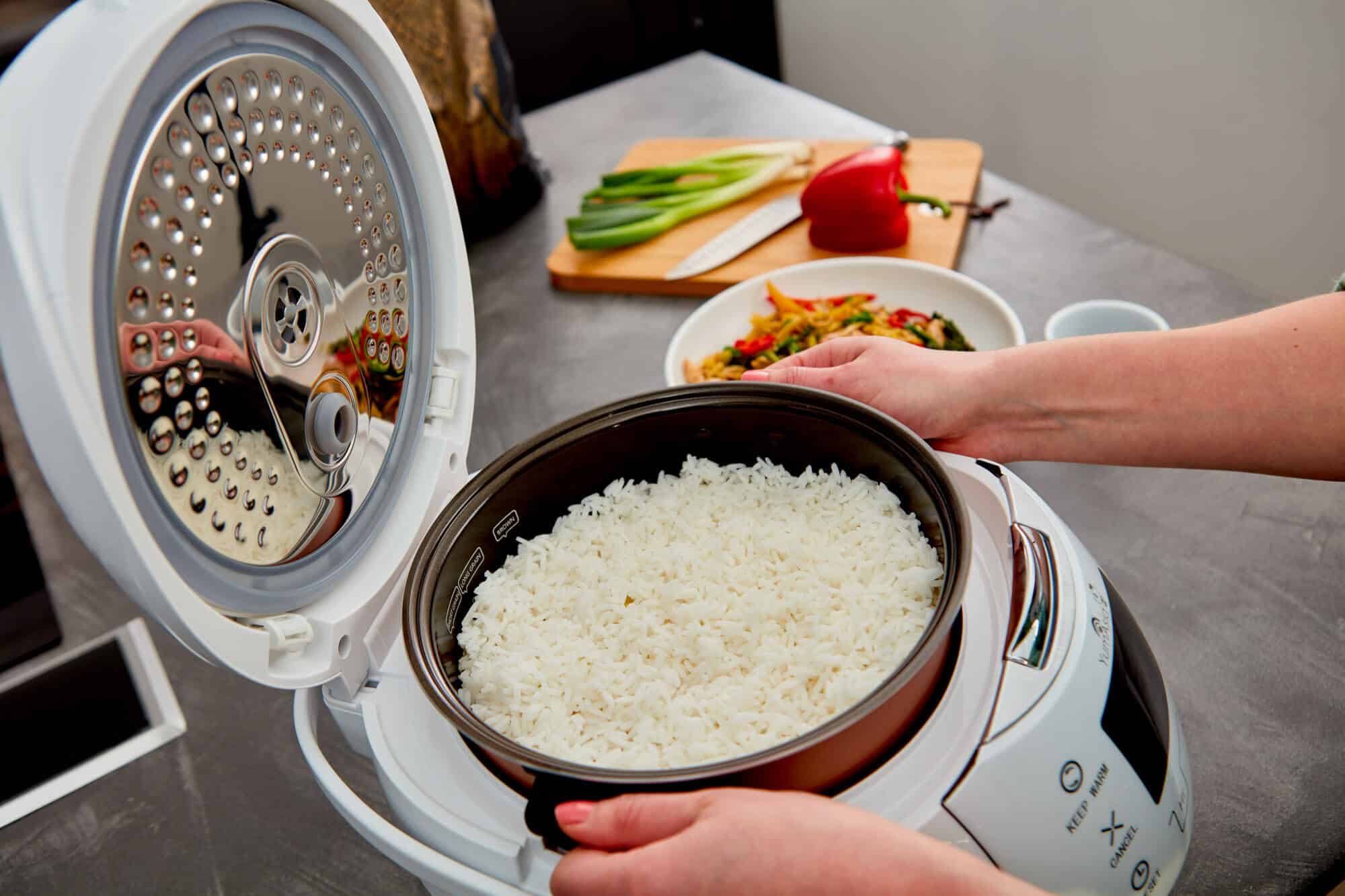 Hands Removing Ninja Bowl From White Sakura