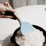 Blue-rice-spoon-spatula-collecting-rice