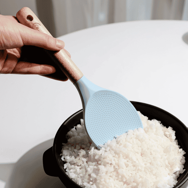 Blue-rice-spoon-spatula-collecting-rice