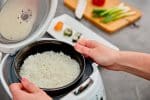 Hands lifting Ninja bowl from Panda 1500px